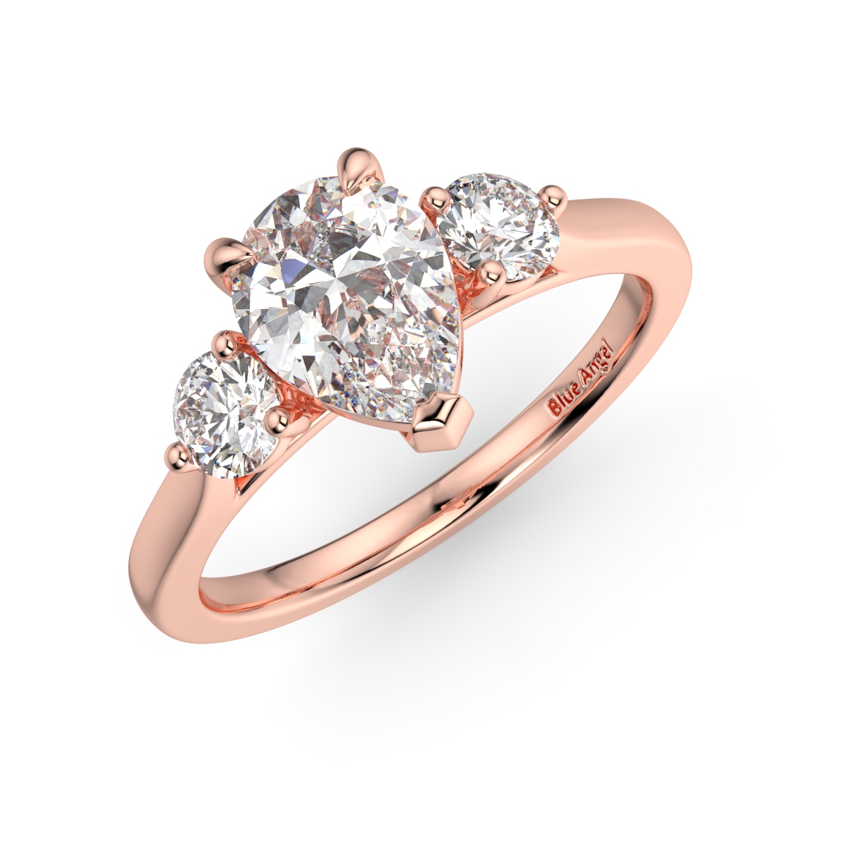 Pear With Round Trilogy Ring