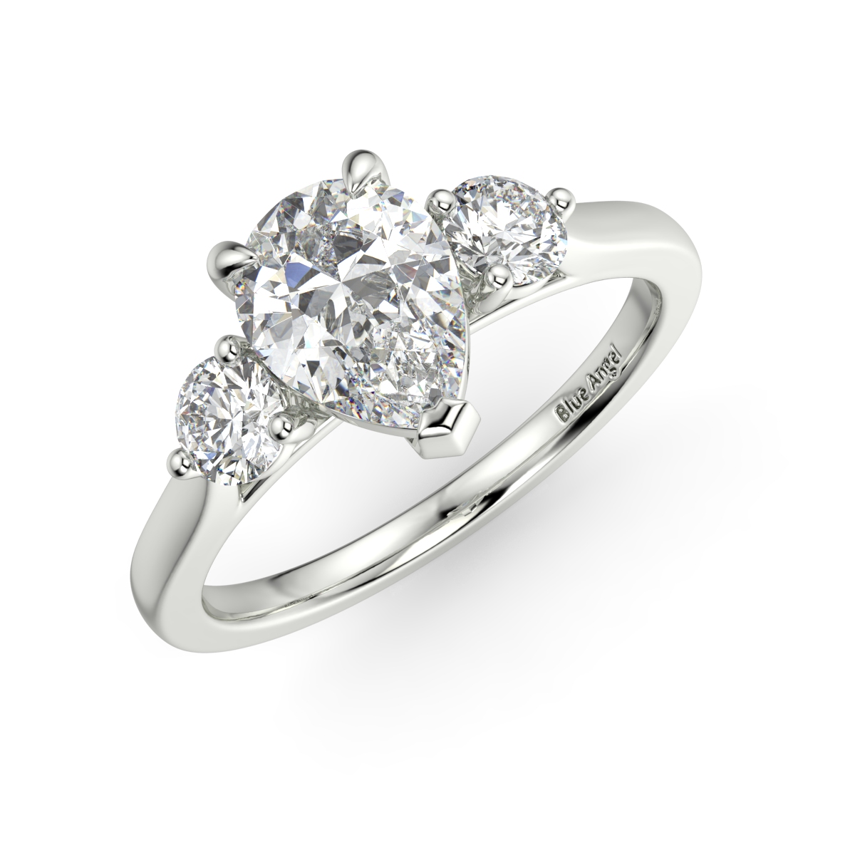 Pear With Round Trilogy Ring